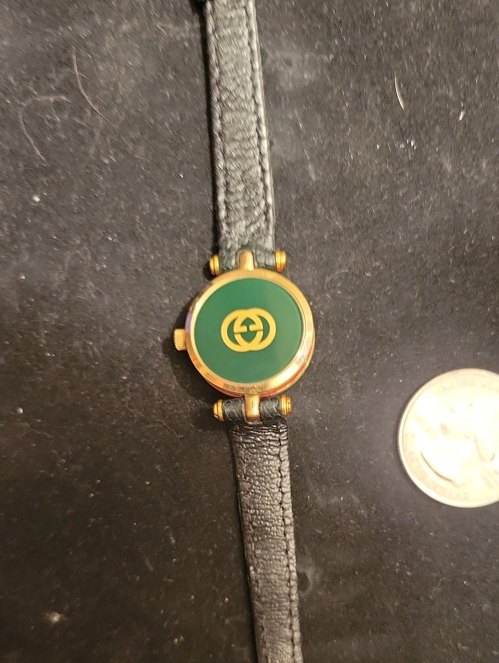 Gucci Gold-Tone Watch with Green Dial and Black Leather Strap